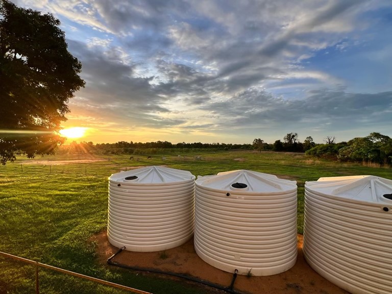 Row of round water tanks